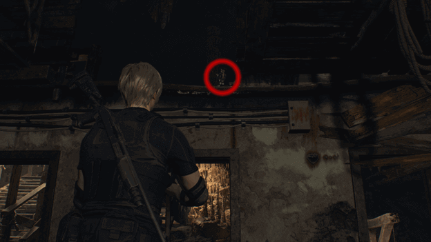 Leon finds a Salazar doll by making the way up the stairs and look above the door in the center